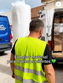 A ByME mover with packing materials next to the van