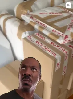 Moving boxes sealed with “very fragile” tape